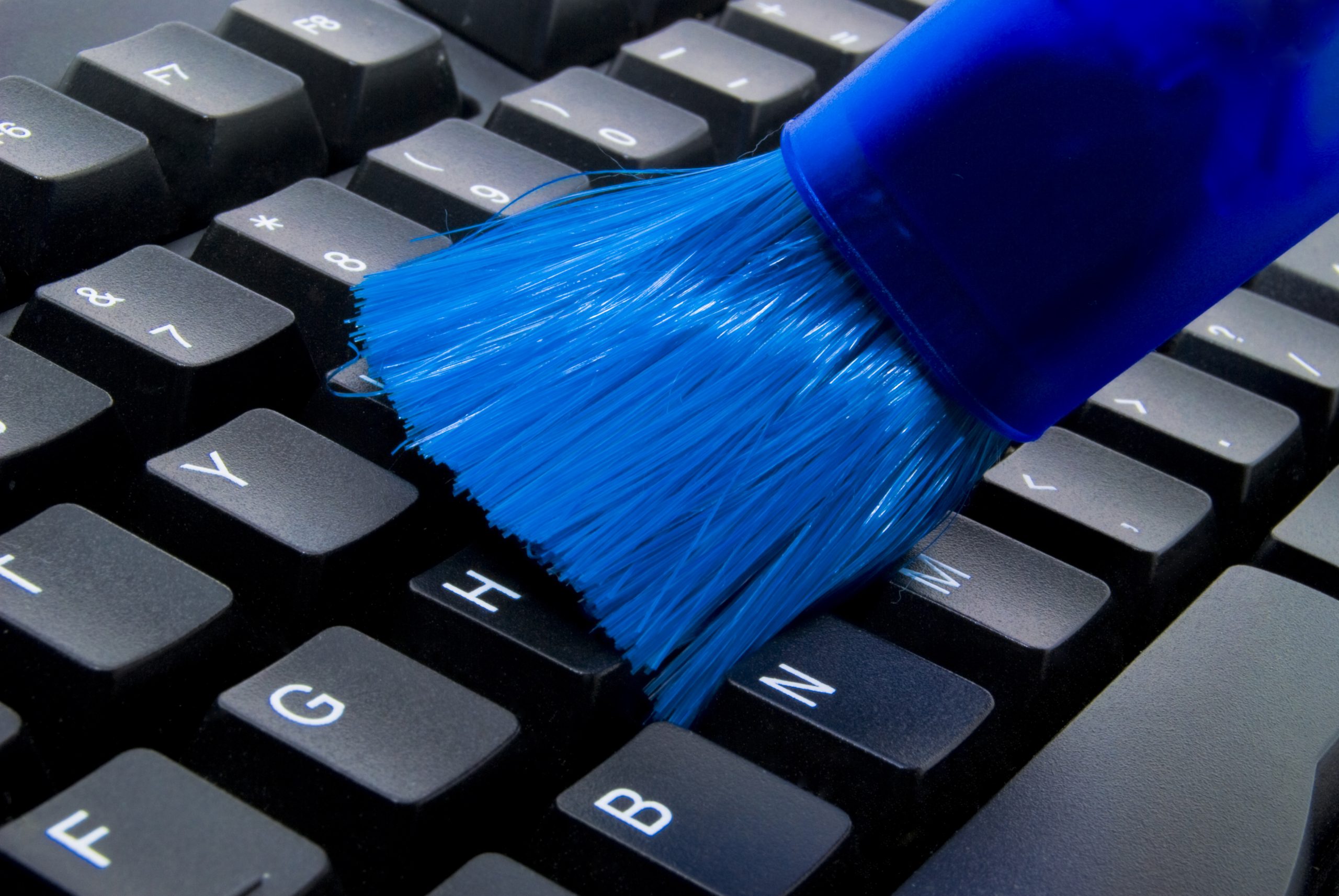 Keyboard,Cleaner,In,Blue,Color,Cleaning,A,Keyboard,In,Black